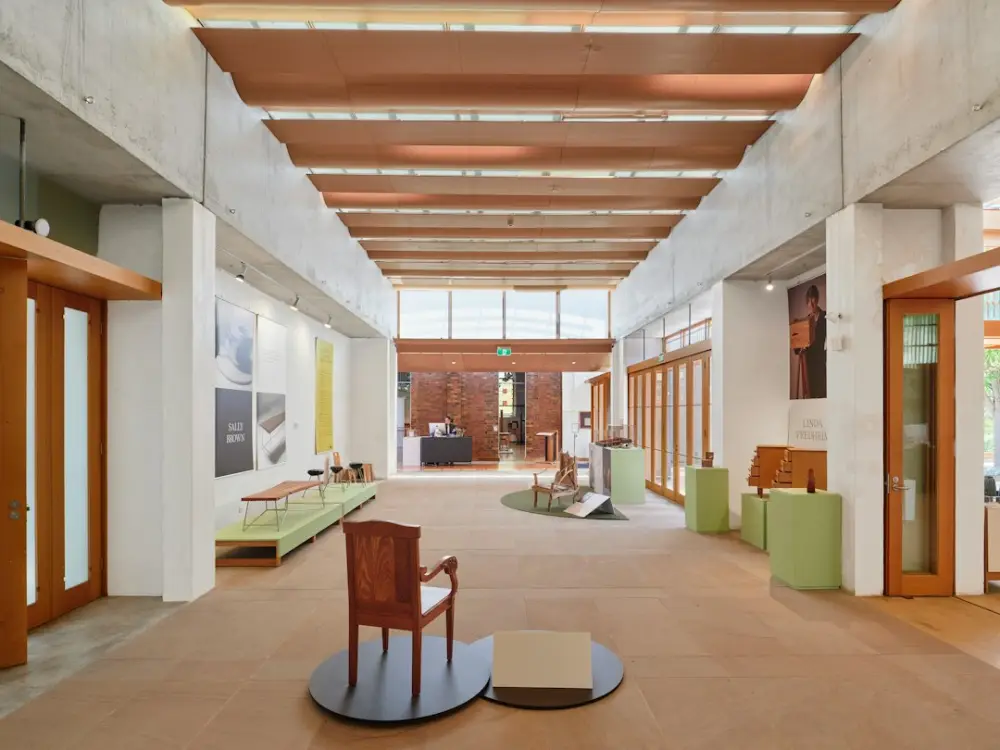 Modern interior design with wooden accents and exhibits, illustrating creative space design